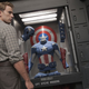 Illustration for article titled A Celebration of Superheroes Staring at Costumes in Fancy Display Cases